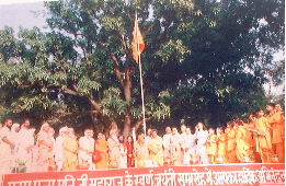 The revered saints hoist a flag of world peace to officially launch the Jayanti Celebrations
