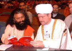 Pujya Swamiji and H.E. Mufti Ravil Gainutdin of Russia review  the program for the Conference.