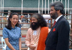 Pujya Swamiji and Shri Bawa Jain with the Princess of Cambodia in front of the UN building.